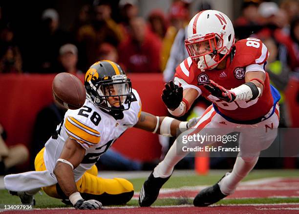 Wide receiver Kenny Bell of the Nebraska Cornhuskers just misses a touchdown reception in front of defensive back Shaun Prater of the Iowa Hawkeyes...