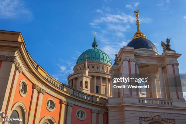 germany,brandenburg,potsdam, dome of saint nicholas church behindpotsdam city palace - potsdam brandenburg stock-fotos und bilder