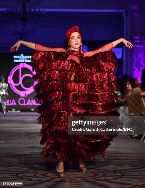 Gaia Wise walks the catwalk at The Icon Ball 2021 during London Fashion Week September 2021 at The Landmark Hotel on September 17, 2021 in London,...