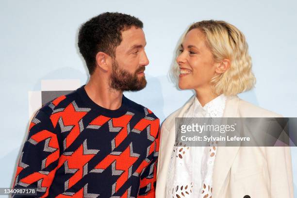 Guillaume Gouix, Alysson Paradis attend the photocall for "Les particules elementaires" during the Fiction Festival - Day Four on September 17, 2021...