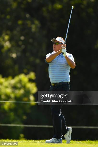 Robert Allenby of Australia shoots his second shot on the 5th hole during the first round of the Sanford International Presented by Cambria at...