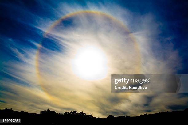 rainbow around the sun - sundog stock pictures, royalty-free photos & images