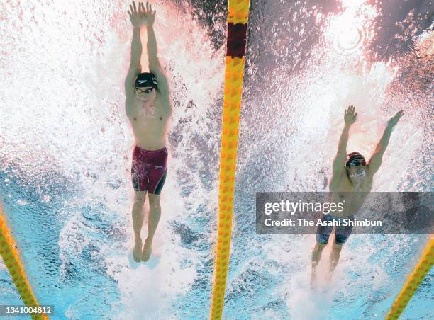 Keiichi Kimura and Uchu Tomita of Team Japan compete in the Swimming Men's 100m Butterfly - S11 Final on day 10 of the Tokyo 2020 Paralympic Games at...