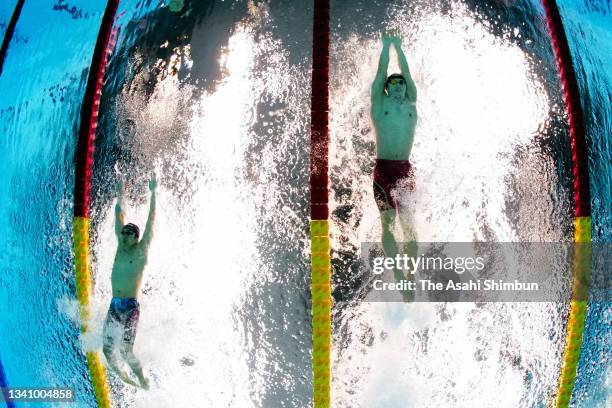 Keiichi Kimura and Uchu Tomita of Team Japan compete in the Swimming Men's 100m Butterfly - S11 Final on day 10 of the Tokyo 2020 Paralympic Games at...