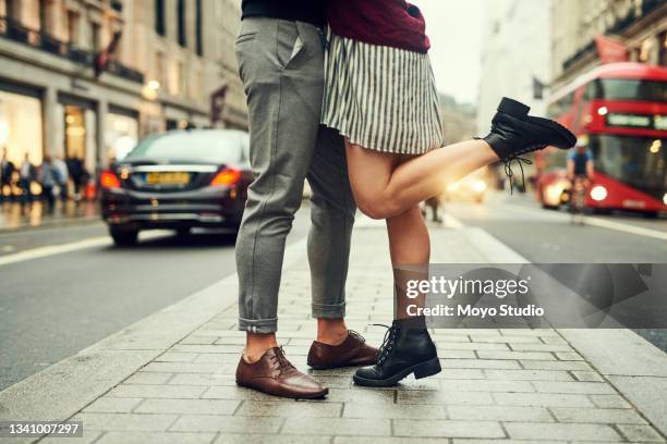 cropped shot of an affectionate young couple sharing a romantic moment in the city - couple close up street stock pictures, royalty-free photos & images