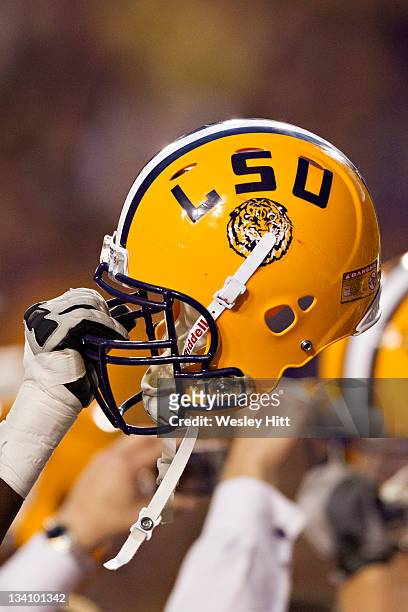Tigers helmet is held up after a game against the Arkansas Razorbacks at Tiger Stadium on November 25, 2011 in Baton Rouge, Louisiana. The Tigers...