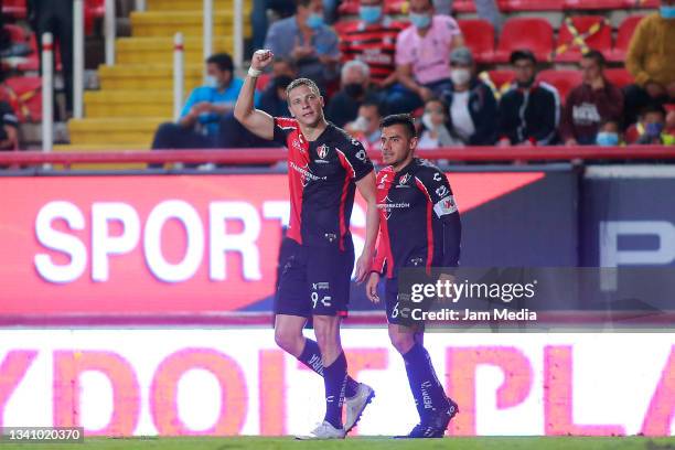 Julio Cesar Furch of Atlas celebrates with Aldo Paul Rocha after scoring his team's second goal during the 9th round match between Necaxa and Atlas...