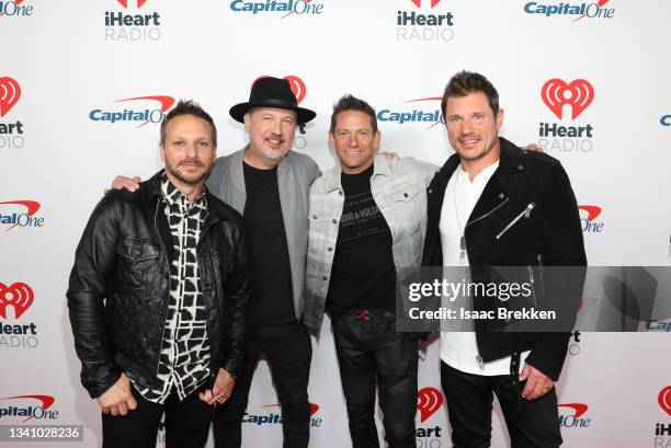 Drew Lachey, Justin Jeffre, Jeff Timmons, and Nick Lachey of 98 Degrees are seen backstage at the 2021 iHeartRadio Music Festival on September 17,...