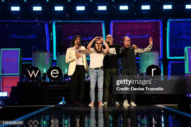 Brian Bell, Rivers Cuomo, Patrick Wilson, and Scott Shriner of Weezer perform onstage during the 2021 iHeartRadio Music Festival on September 17,...
