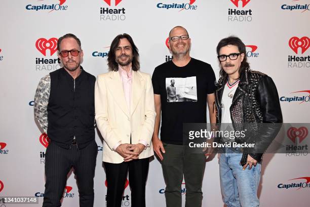 Scott Shriner, Brian Bell, Patrick Wilson, and Rivers Cuomo of Weezer attend the 2021 iHeartRadio Music Festival on September 17, 2021 at T-Mobile...
