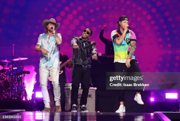 Nelly and Florida Georgia Line's Brian Kelley and Tyler Hubbard perform onstage during the 2021 iHeartRadio Music Festival on September 17, 2021 at...