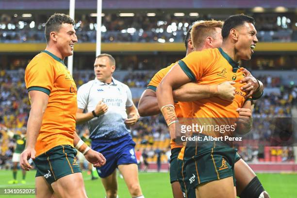 Len Ikitau of the Wallabies celebrates scoring a try during The Rugby Championship match between the Australian Wallabies and the South Africa...