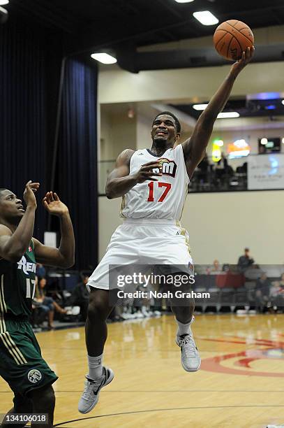 Osiris Eldridge of the Bakersfield Jam goes hard to the hoop against Chris Matthews of the Reno Bighorns on November 25, 2011 at the Jam Event Center...