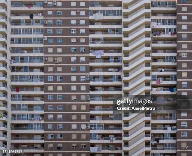 a facade plenty of windows - touristic flats - apartamentos stock pictures, royalty-free photos & images