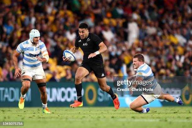 Rieko Ioane of the All Blacks makes a break during The Rugby Championship match between the Argentina Pumas and the New Zealand All Blacks at Suncorp...