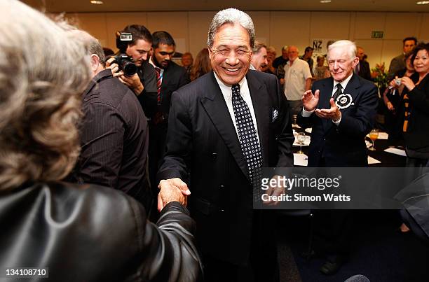 Leader of the New Zealand First Party Winston Peters greets party members as New Zealanders go to the polls during the 2011 General Election on...