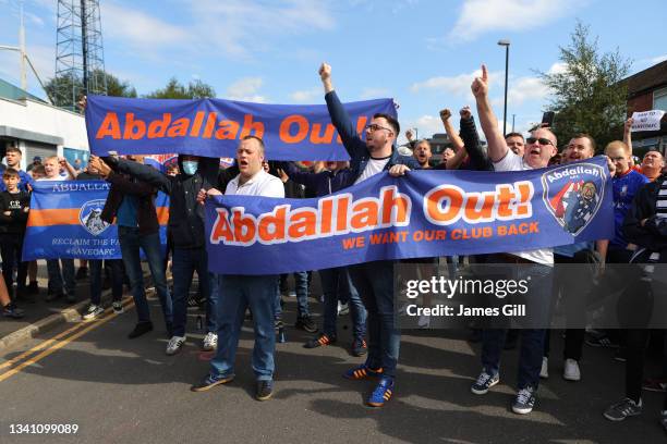 Fans protest outside the stadium against Oldham Athletic owner Abdallah Lemsagem prior to the Sky Bet League Two match between Oldham Athletic and...