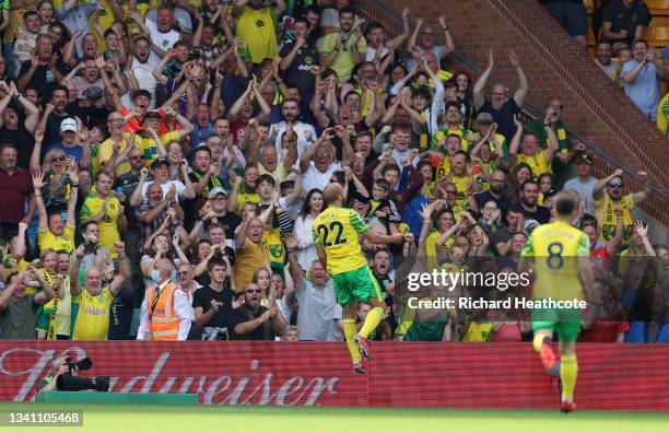 Teemu Pukki of Norwich City celebrates after scoring their team's first goal during the Premier League match between Norwich City and Watford at...