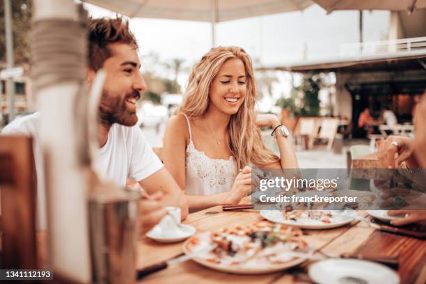 mixed racial friends doing breakfast at the cafe - milan cafe stock pictures, royalty-free photos & images