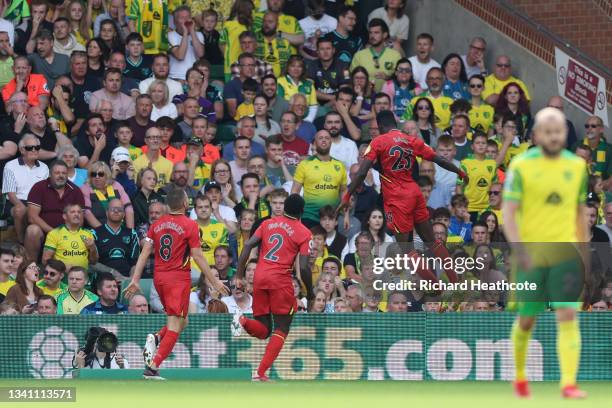 Ismaila Sarr of Watford FC celebrates after scoring their team's second goal during the Premier League match between Norwich City and Watford at...