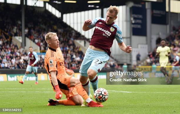 Matej Vydra of Burnley is challenged by Aaron Ramsdale of Arsenal leading to a penalty which is overturned following a VAR review during the Premier...