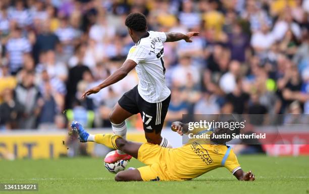 Ivan Cavaleiro of Fulham is tackled by Andy Yiadom of Reading during the Sky Bet Championship match between Fulham and Reading at Craven Cottage on...