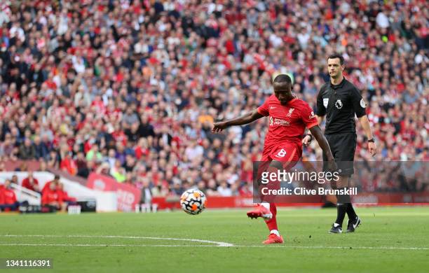 Naby Keita of Liverpool scores their team's third goal during the Premier League match between Liverpool and Crystal Palace at Anfield on September...