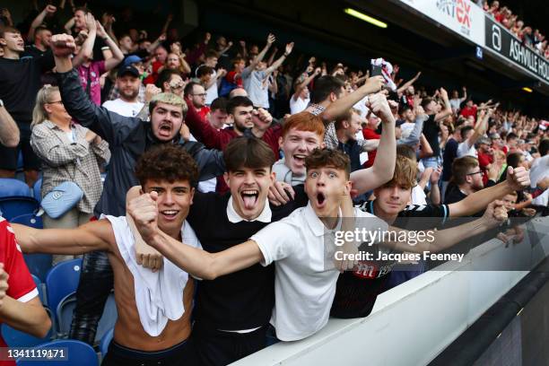 Bristol City fans celebrate at full time following the Sky Bet Championship match between Queens Park Rangers and Bristol City at The Kiyan Prince...