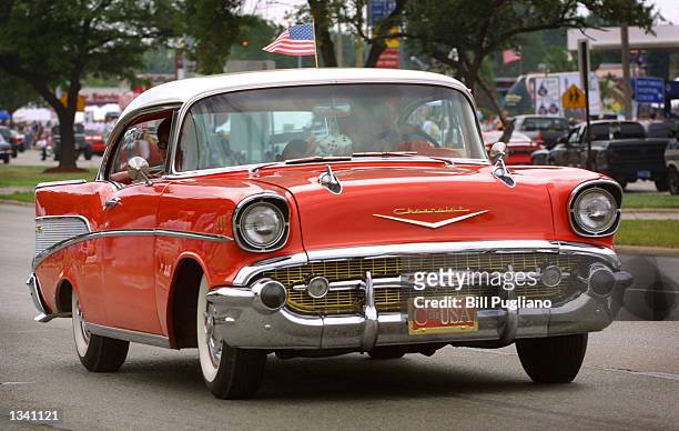 Classic car cruises down Woodward Avenue during the 8th Annual Woodward Dream Cruise August 17, 2002 in Royal Oak, Michigan. The cruise is the...