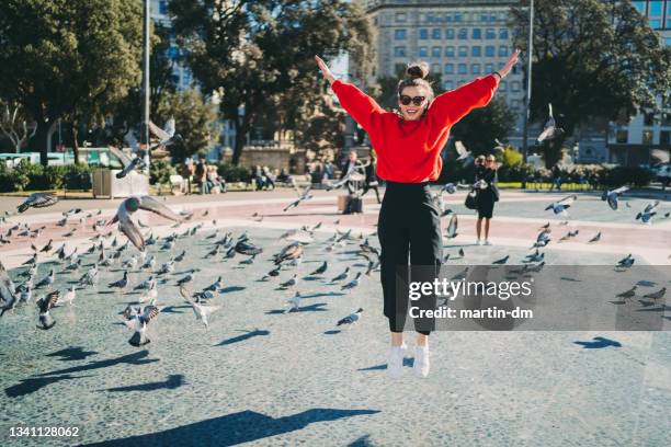 happy tourist woman in barcelona - spread wings stock pictures, royalty-free photos & images
