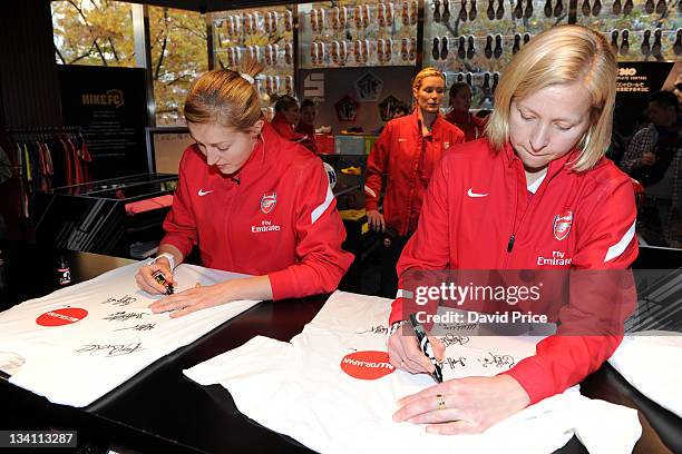 Ellen White and Jayne Ludlow of Arsenal Ladies FC during a visit to the Nike Store on November 26, 2011 in Tokyo, Japan.