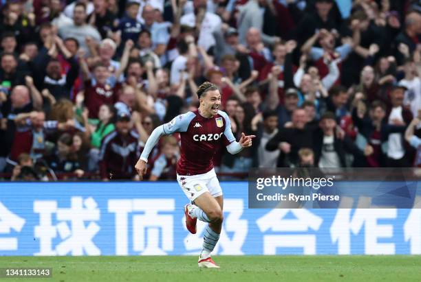 Matty Cash of Aston Villa celebrates after scoring their team's first goal during the Premier League match between Aston Villa and Everton at Villa...