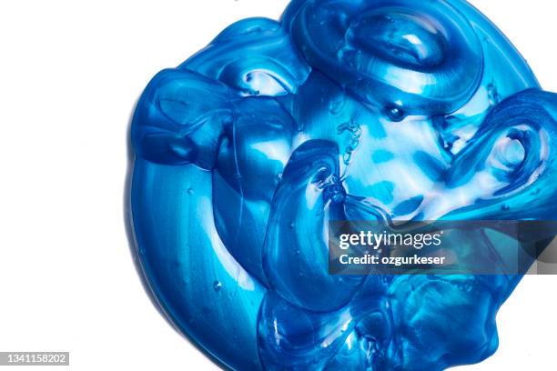 blue slime on white background - goop stockfoto's en -beelden