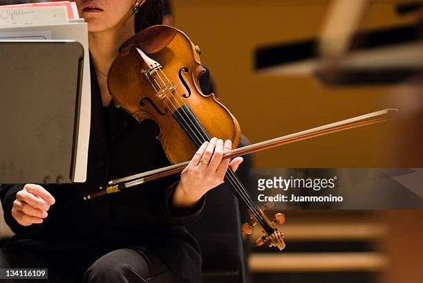 the violinist 2 - classical orchestral music stock pictures, royalty-free photos & images