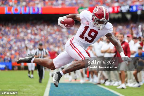 Jahleel Billingsley of the Alabama Crimson Tide scores a touchdown during the first quarter of a game against the Florida Gators at Ben Hill Griffin...