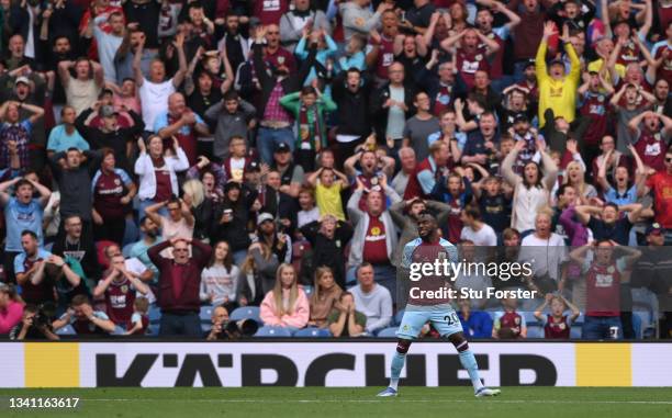 Burnley player Maxwel Cornet and the Burnley fans react after a chance is missed during the Premier League match between Burnley and Arsenal at Turf...