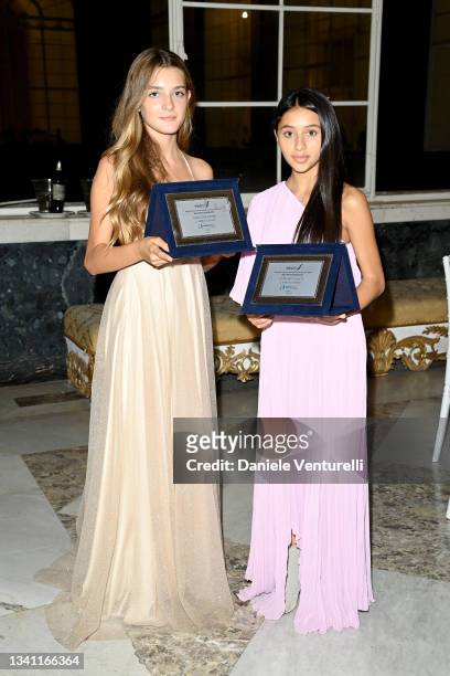 Elisa del Genio and Ludovica Nasti pose with their awards after the Nastri d'Argento Grandi Serie Internazionali awards ceremony on September 18,...