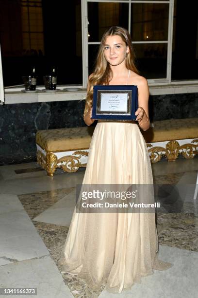 Elisa del Genio poses with her award after the Nastri d'Argento Grandi Serie Internazionali awards ceremony on September 18, 2021 in Naples, Italy.