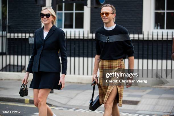 Guests seen outside KNWLS during London Fashion Week September 2021 on September 18, 2021 in London, England.