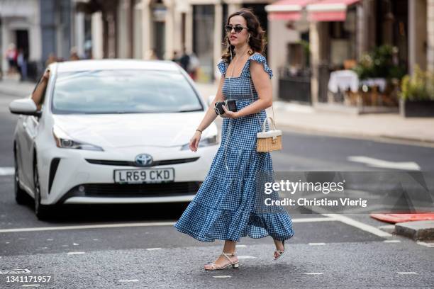 Guest is seen wearing dress outside KNWLS during London Fashion Week September 2021 on September 18, 2021 in London, England.