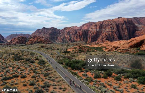 Athletes ride through Snow Canyon State Park during the IRONMAN 70.3 World Championship on September 18, 2021 in St George, Utah.