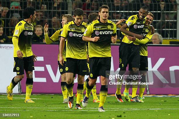 Felipe Santana celebrates the second goal with Mario Goetzeof Dortmund during the Bundesliga match between Borussia Dortmund and FC Schalke 04 at...