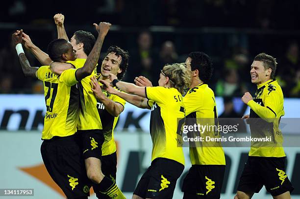 Felipe Santana of Dortmund celebrates with team mates after scoring his team's second goal during the Bundesliga match between Borussia Dortmund and...