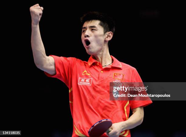 Jike Zhang of China celebrates victory against Liqin Wang of China during the Mens Singles Quarter Finals match during day three of the ITTF Pro Tour...