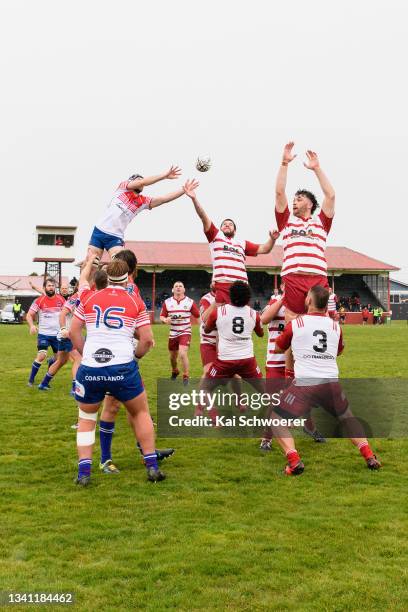 Daniel Smith of Horowhenua Kapiti, Kelly Rasmussen of West Coast and Ethan Simpson of West Coast compete for a lineout during the round one Heartland...