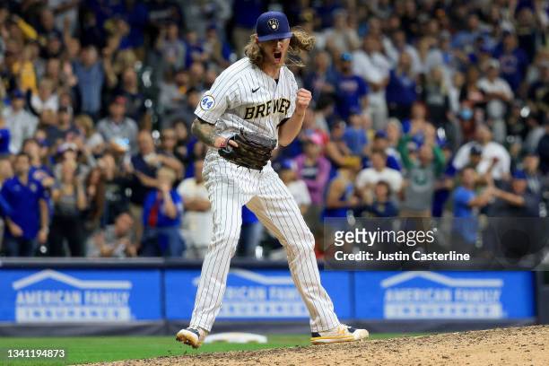 Josh Hader of the Milwaukee Brewers celebrates after a strike out during the ninth inning in the game against the Chicago Cubs at American Family...