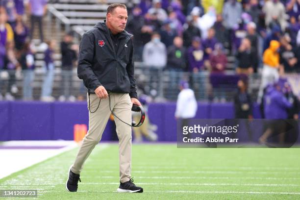 Head Coach Butch Jones of the Arkansas State Red Wolves looks on during the game against the Washington Huskies during the third quarter at Husky...