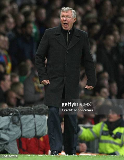 Sir Alex Ferguson of Manchester United complains to the assistant referee during the Barclays Premier League match between Manchester United and...