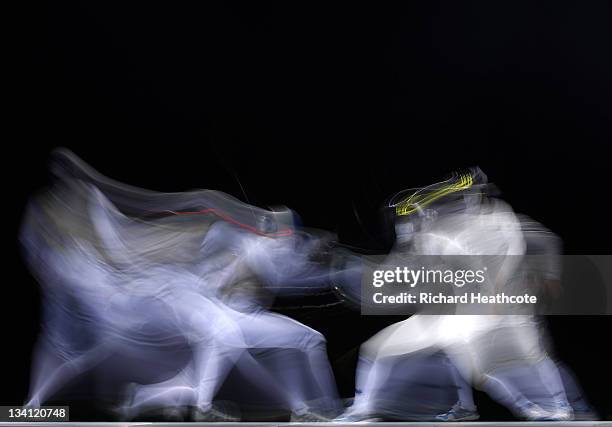 Miles Chamley-Watson of the USA in action against Tommaso Lari of Italy in the semi finals of the Men's Foil Individual at the Fencing Invitational,...