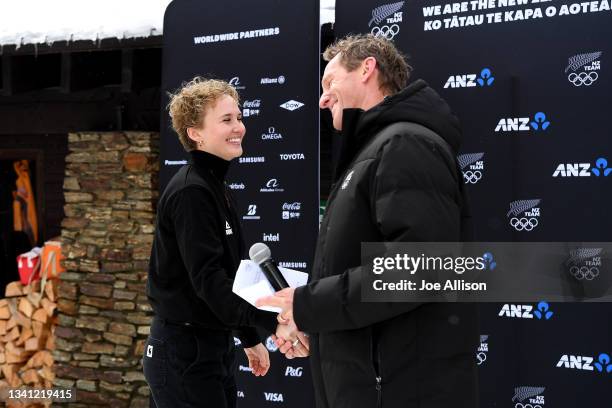 Margaux Hackett shakes hands with Marty Toomey during the New Zealand Olympic Committee Athlete Selection Announcement for the 2022 Beijing Winter...